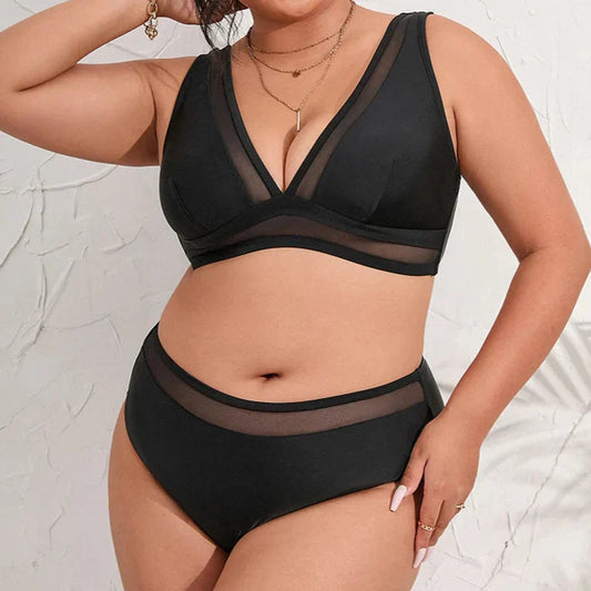 Plus size two-piece swimsuit with high-waisted bottoms.