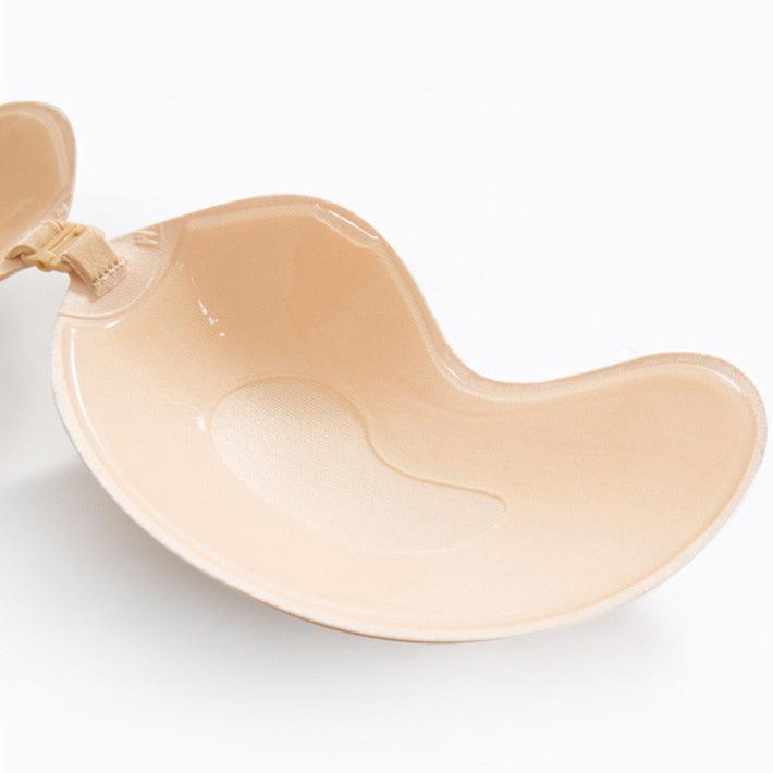 Self-adhesive bra with silicone adhesive material