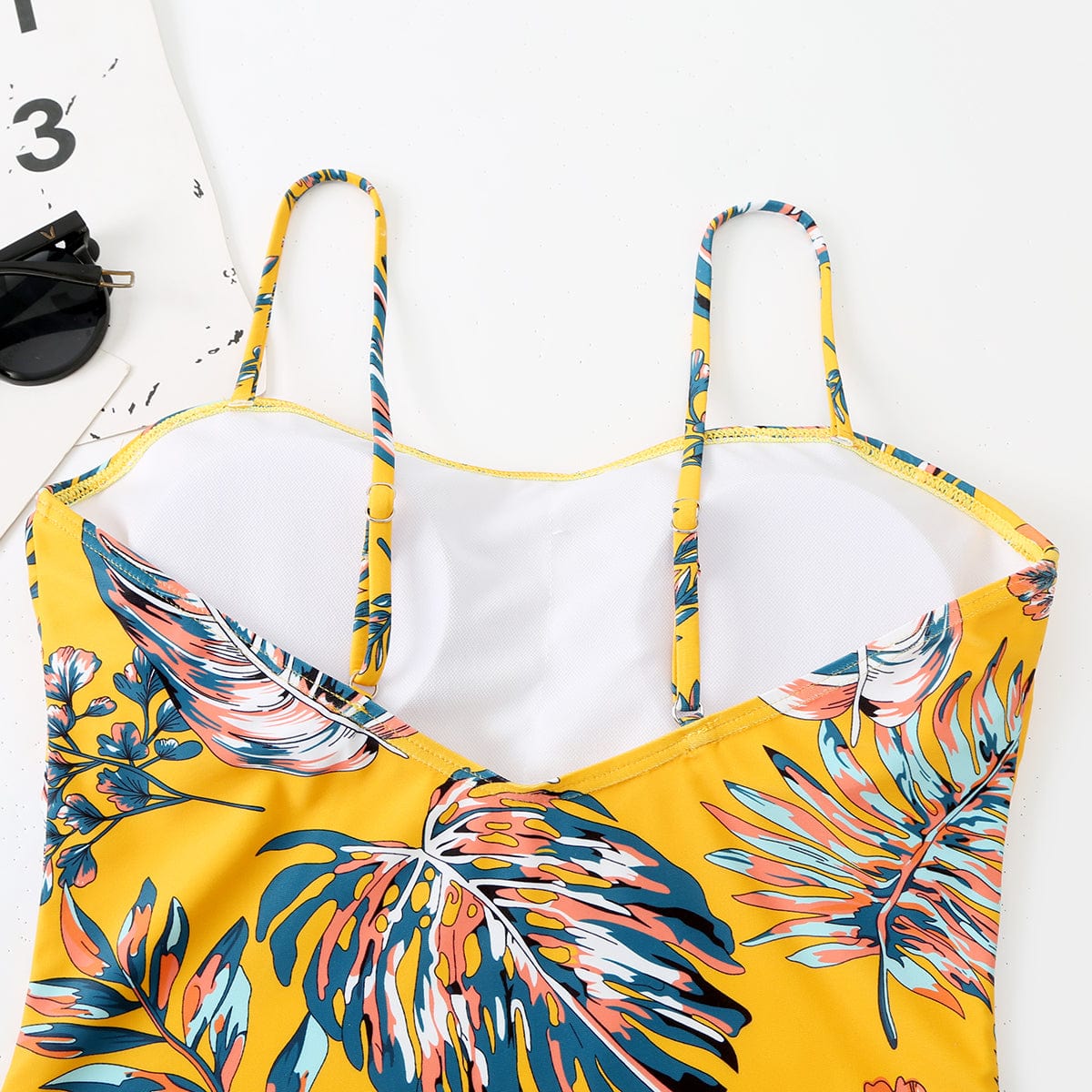 One-piece swimsuit with adjustable straps