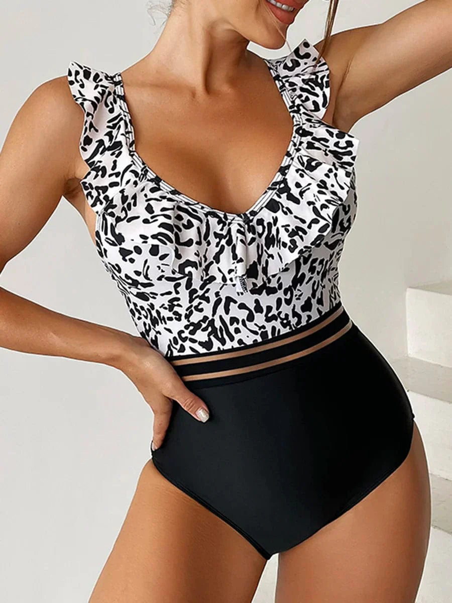 One-piece swimsuit with a decorative frill