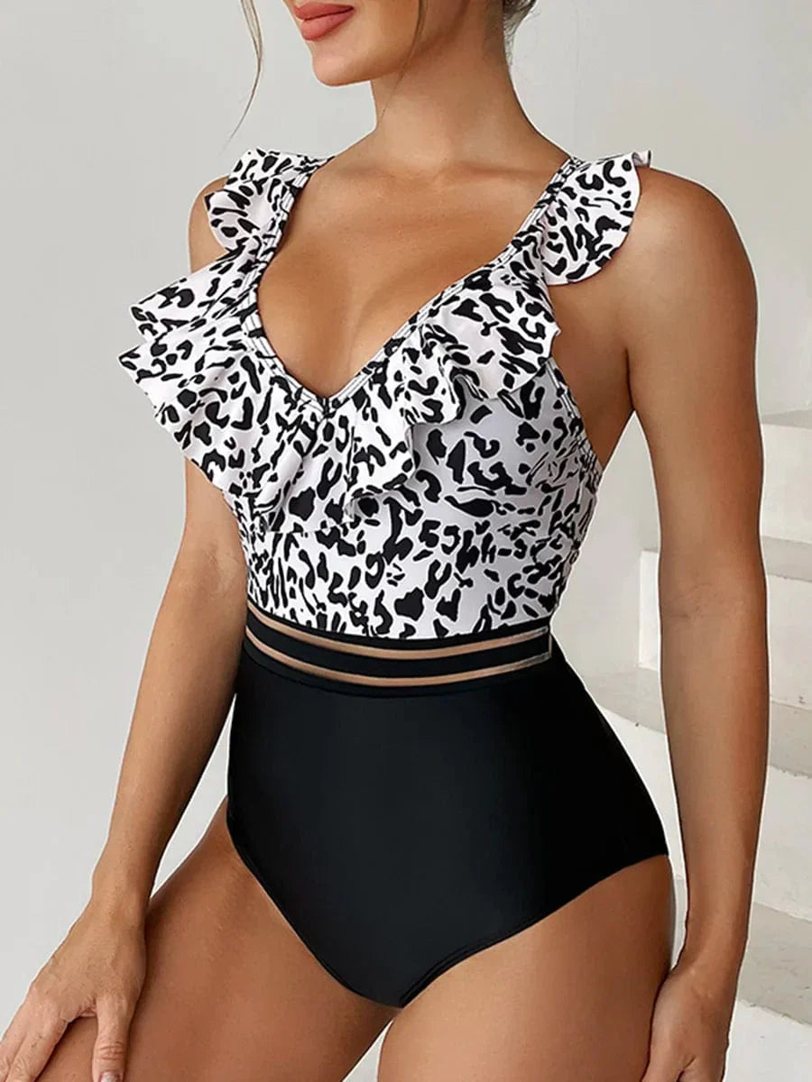 One-piece swimsuit with a decorative frill