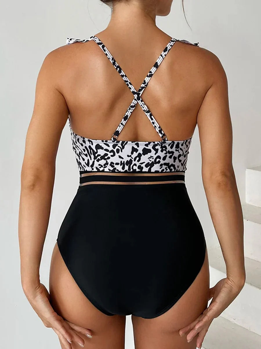 One-piece swimsuit with a decorative frill