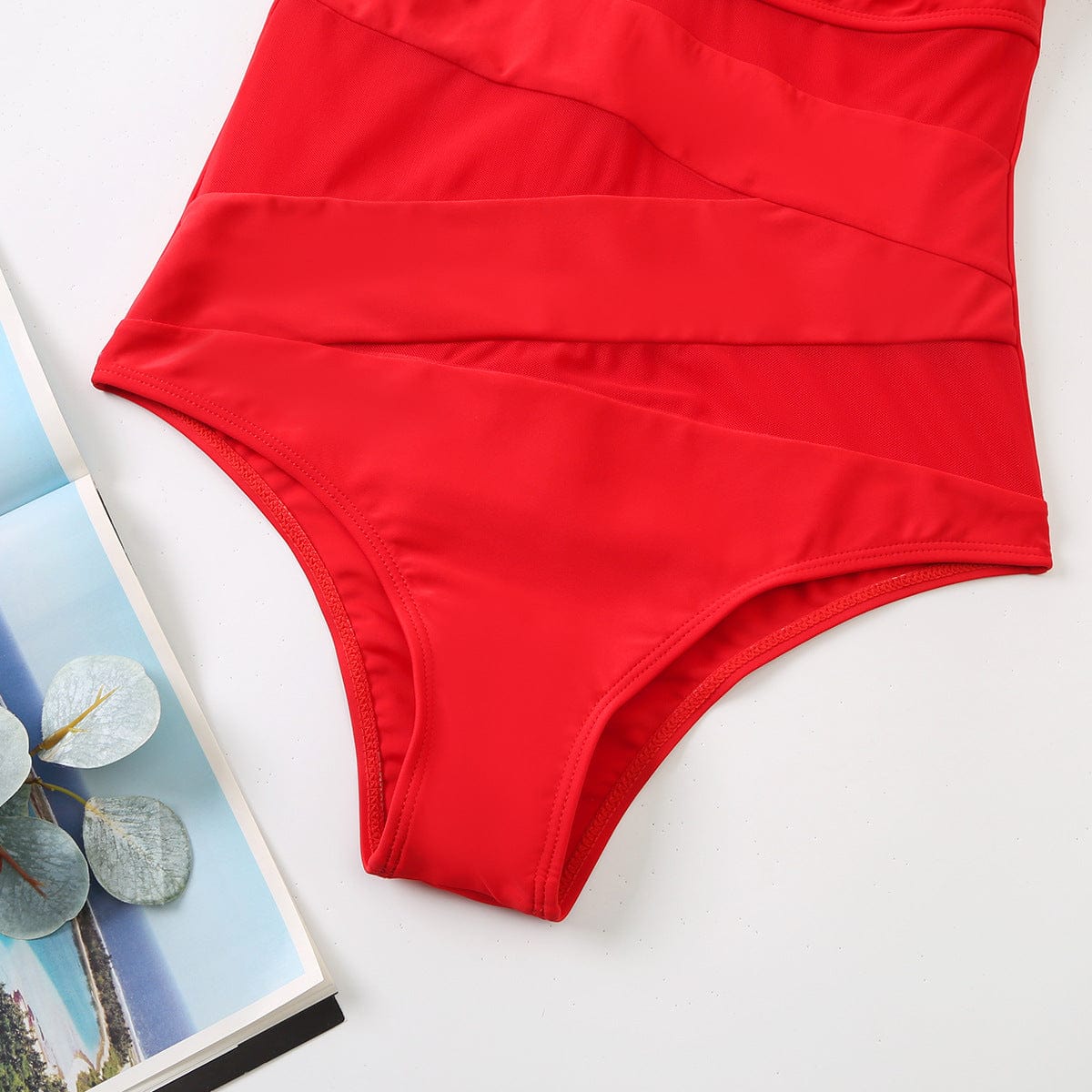 One-piece swimsuit with mesh.