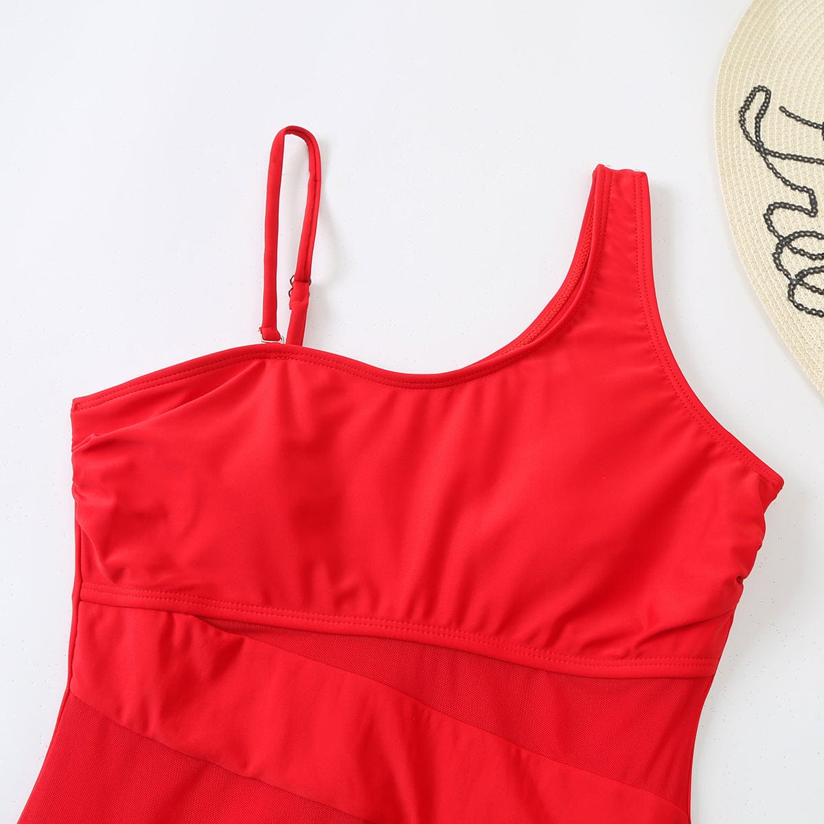 One-piece swimsuit with mesh.