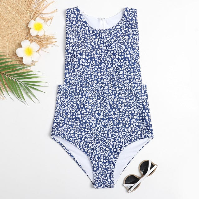 One-piece swimsuit with a zip at the back.