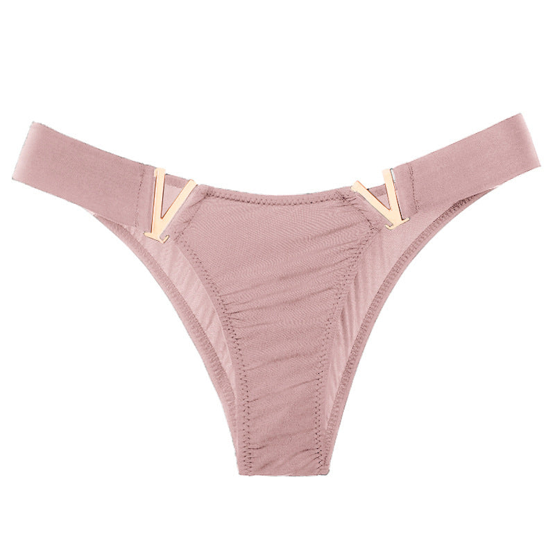 Fig leaves with metal elements in rose gold colour.