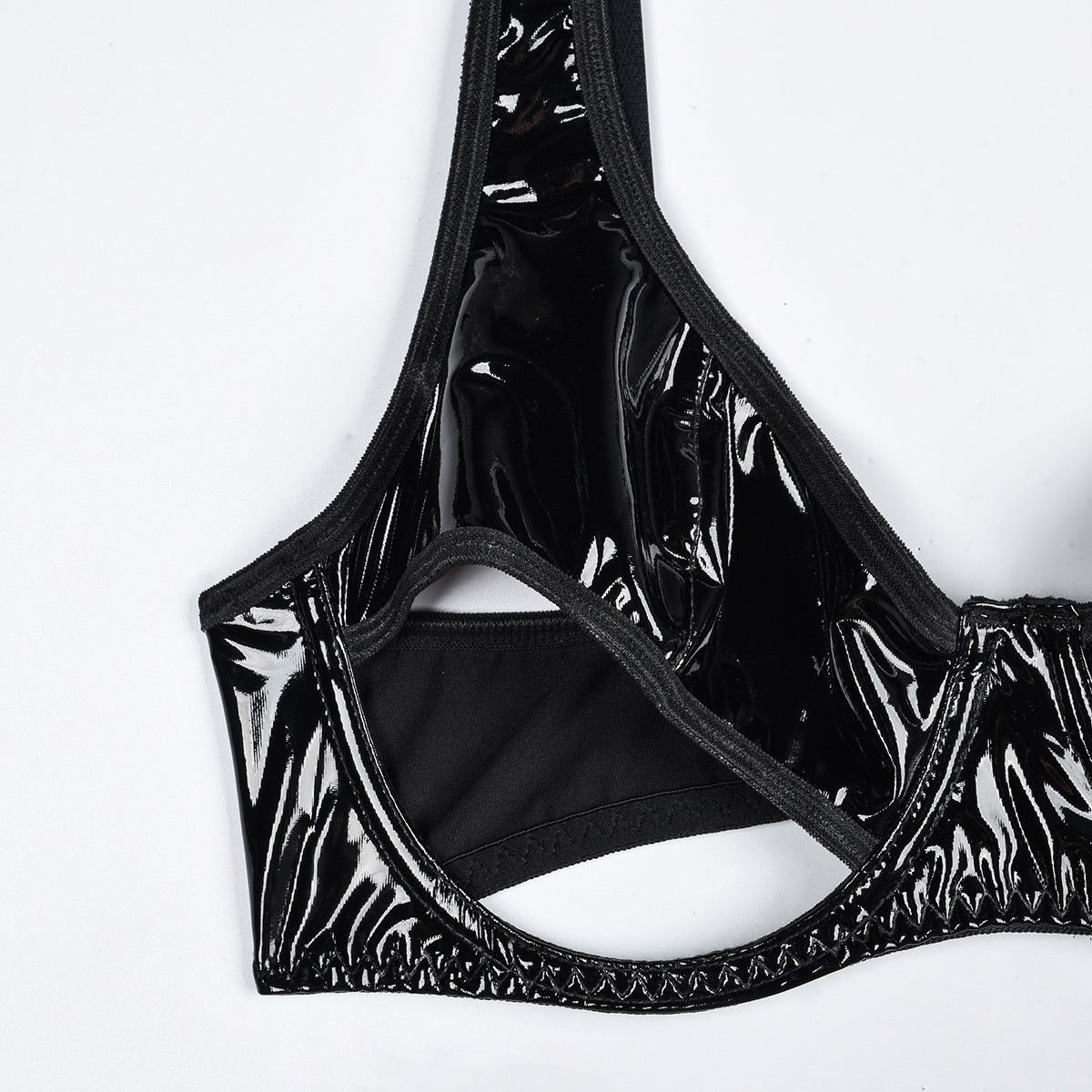 Lingerie set imitating latex with cut-outs at the bust.
