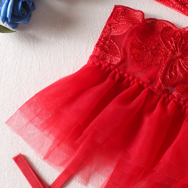 A set of lingerie made from sheer material with a floral pattern.