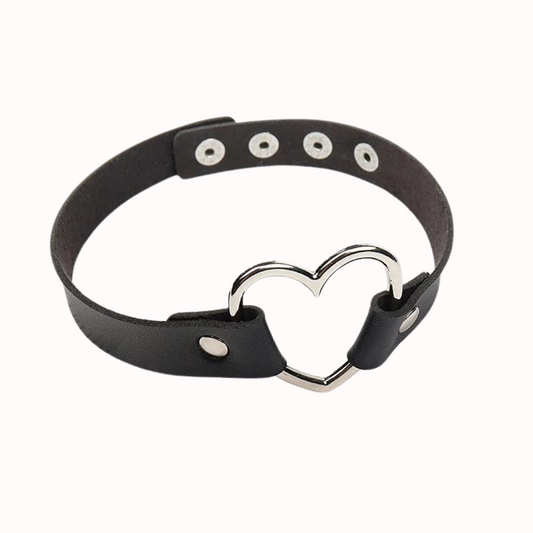 Adjustable leather choker with a heart.