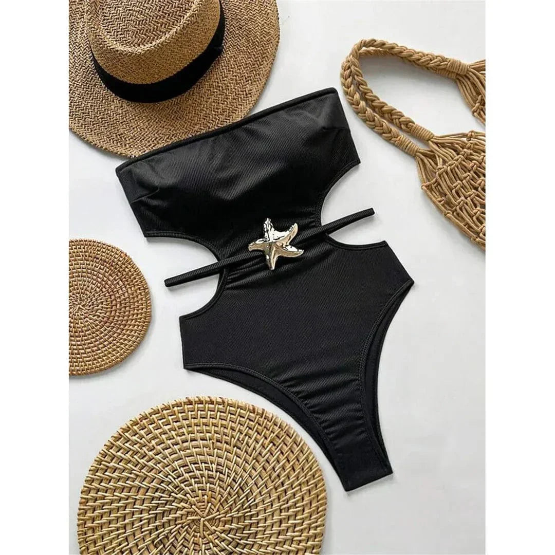 One-piece swimsuit with cut-outs at the waist.