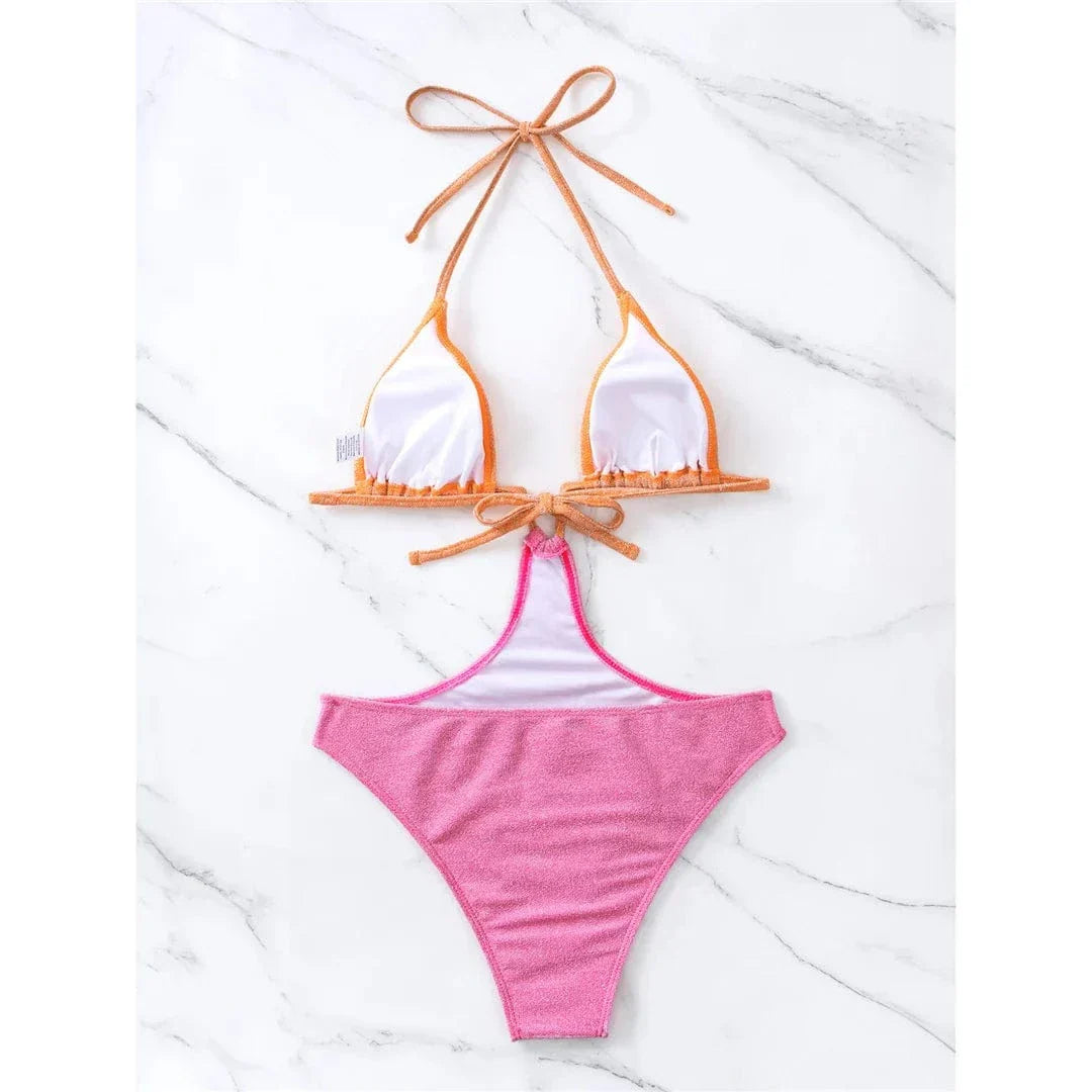 One-piece swimsuit with cut-outs at the waist