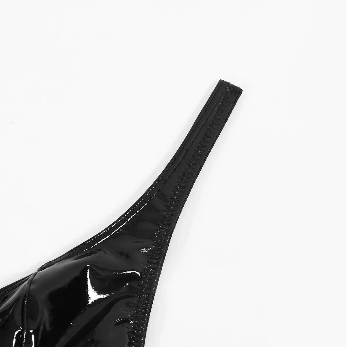 Lingerie set imitating latex with cut-outs at the bust.