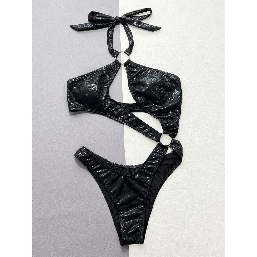 Asymmetrical one-piece swimsuit with deep cut-outs