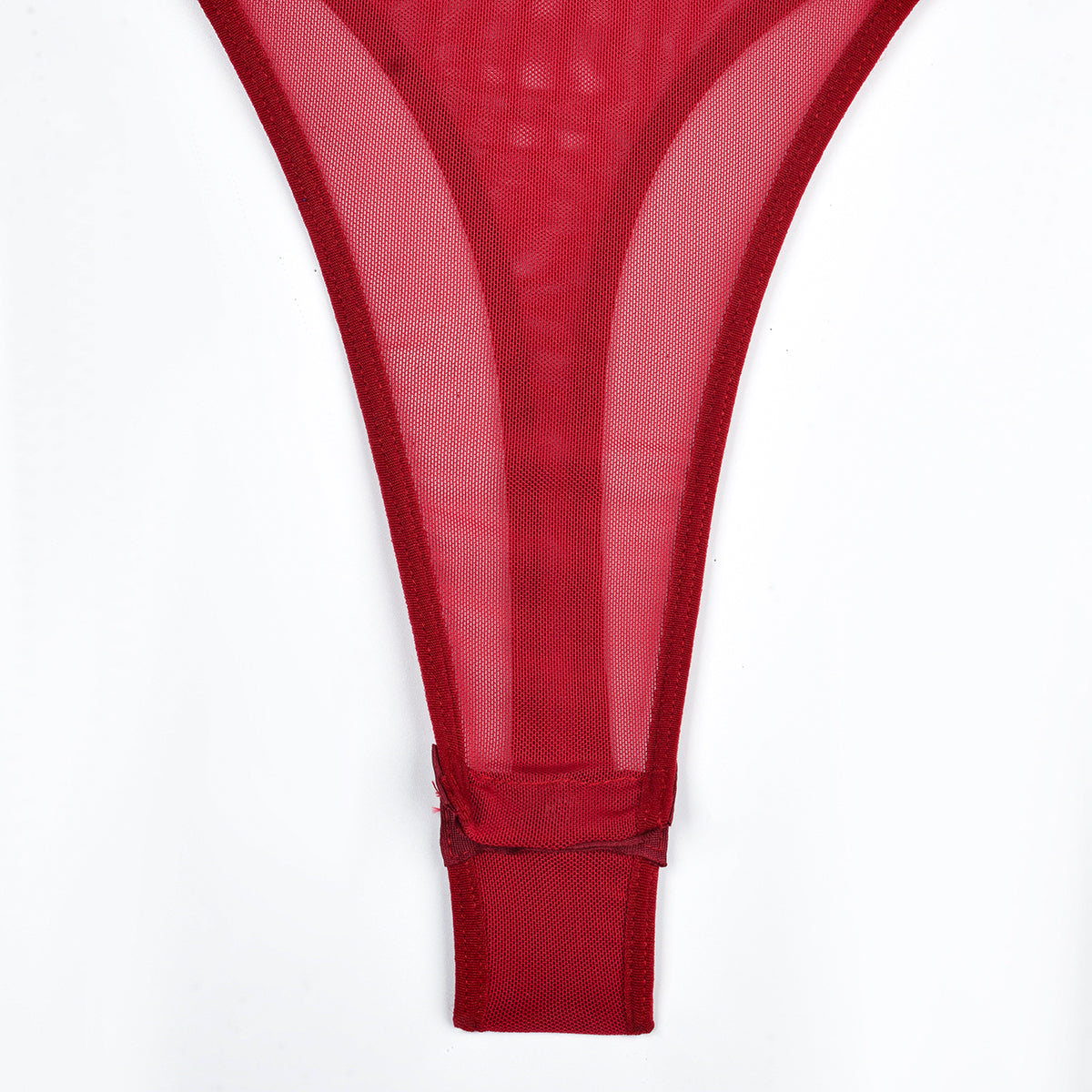 Lacy bodysuit with decorative straps