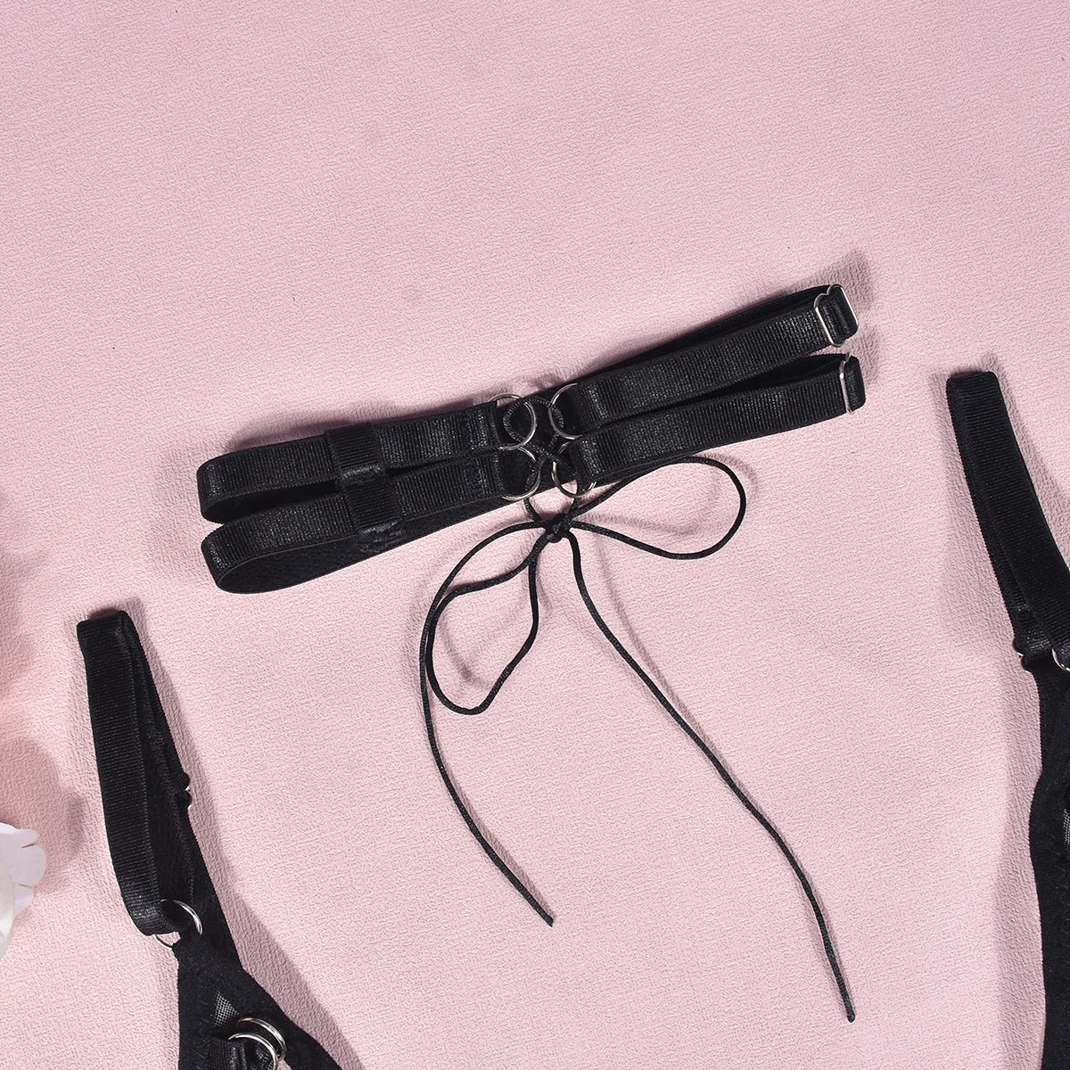 A set of lingerie made from sheer mesh material.