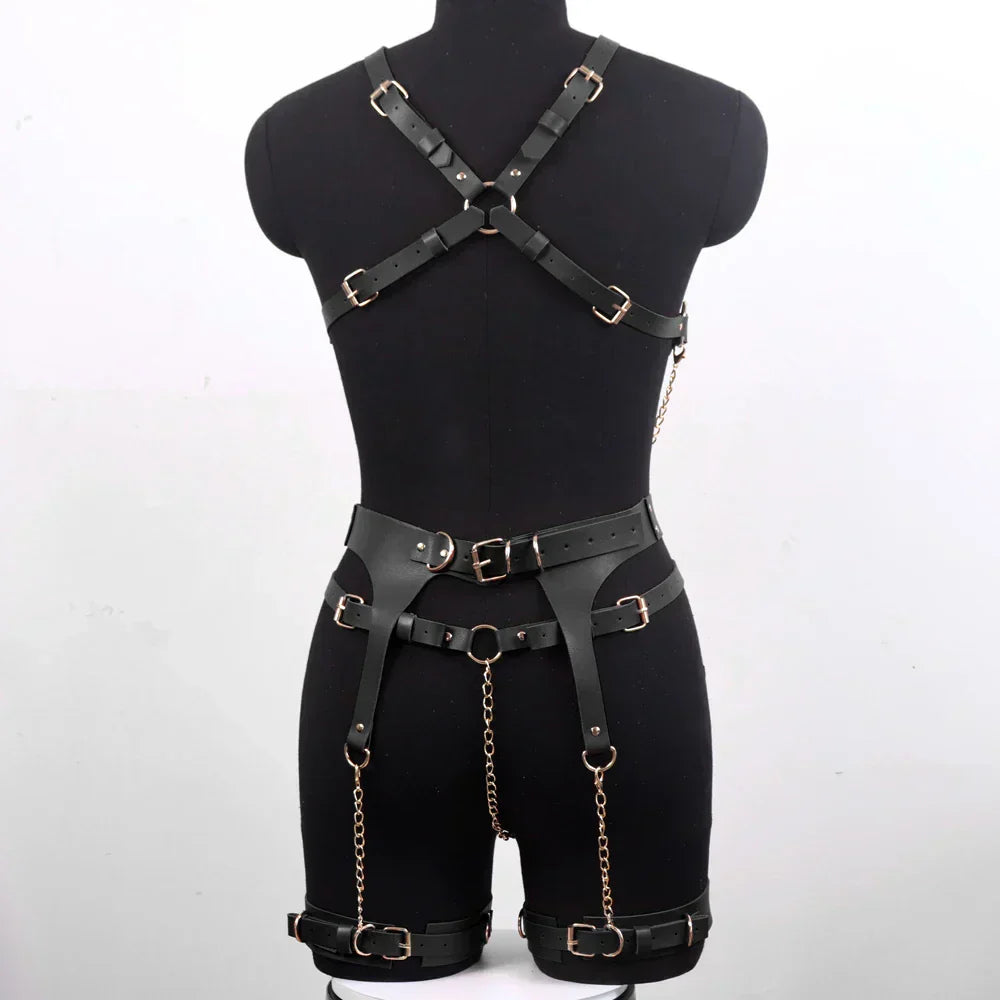 A complete leather lingerie set with metal chains.