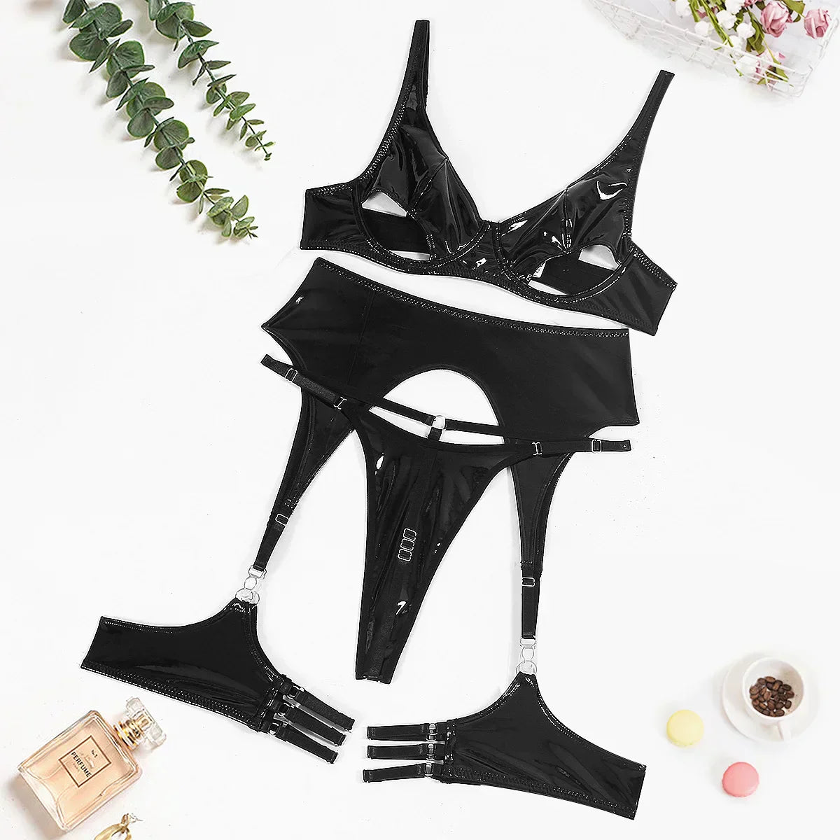 Lingerie set imitating latex with cut-outs at the bust.
