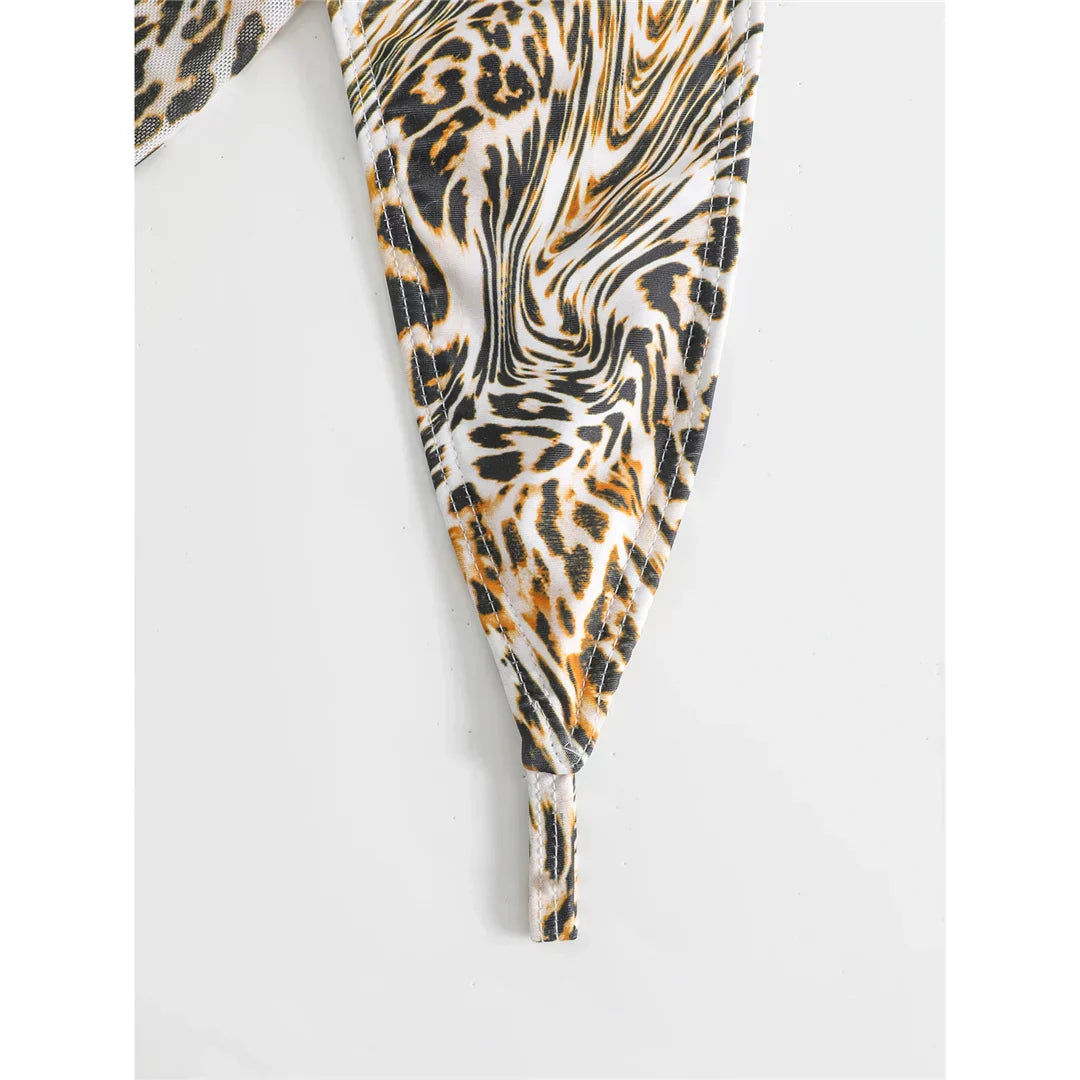 Two-piece leopard print swimsuit with a tie-up bikini top.
