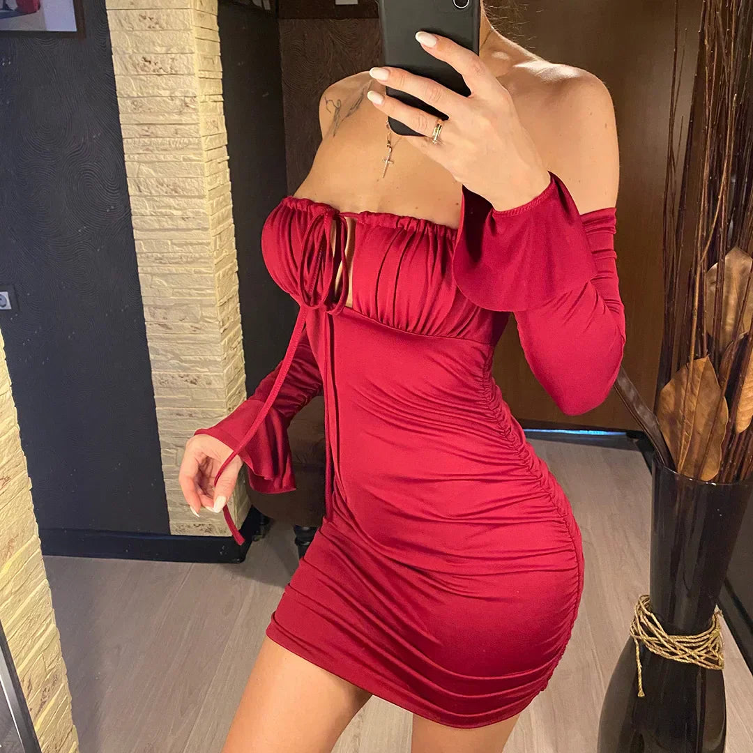 Beach dress with exposed shoulders