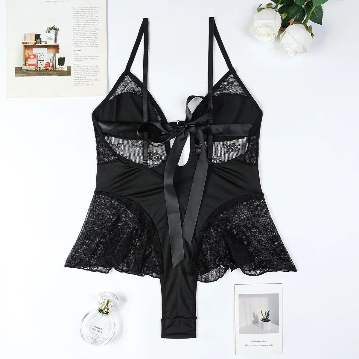 Body with a deep V-neckline adorned with rhinestones.