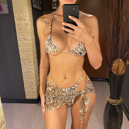 Two-piece leopard print swimsuit with a tie-up bikini top.