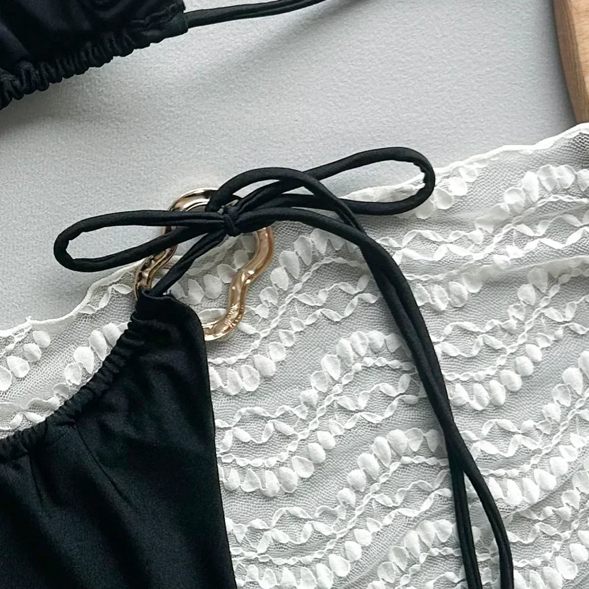 Two-piece swimsuit with triangular cups