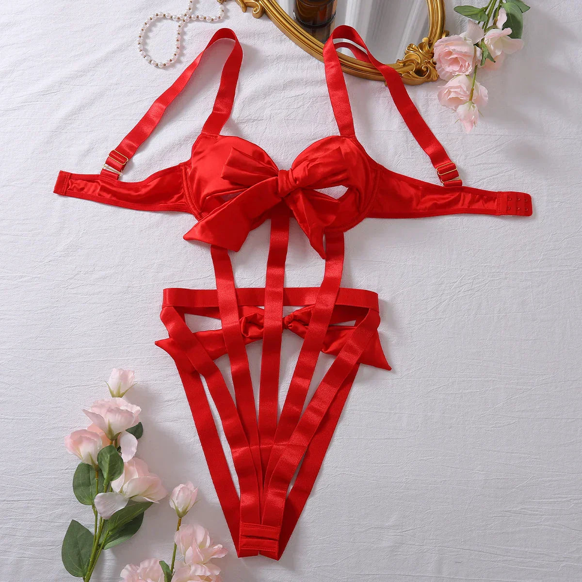 Body with a deep neckline and a bow on the bust.
