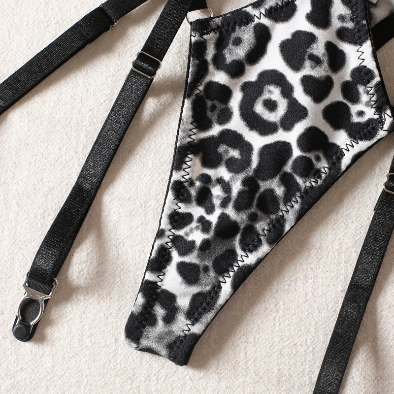 A leopard print lingerie set with open cups.