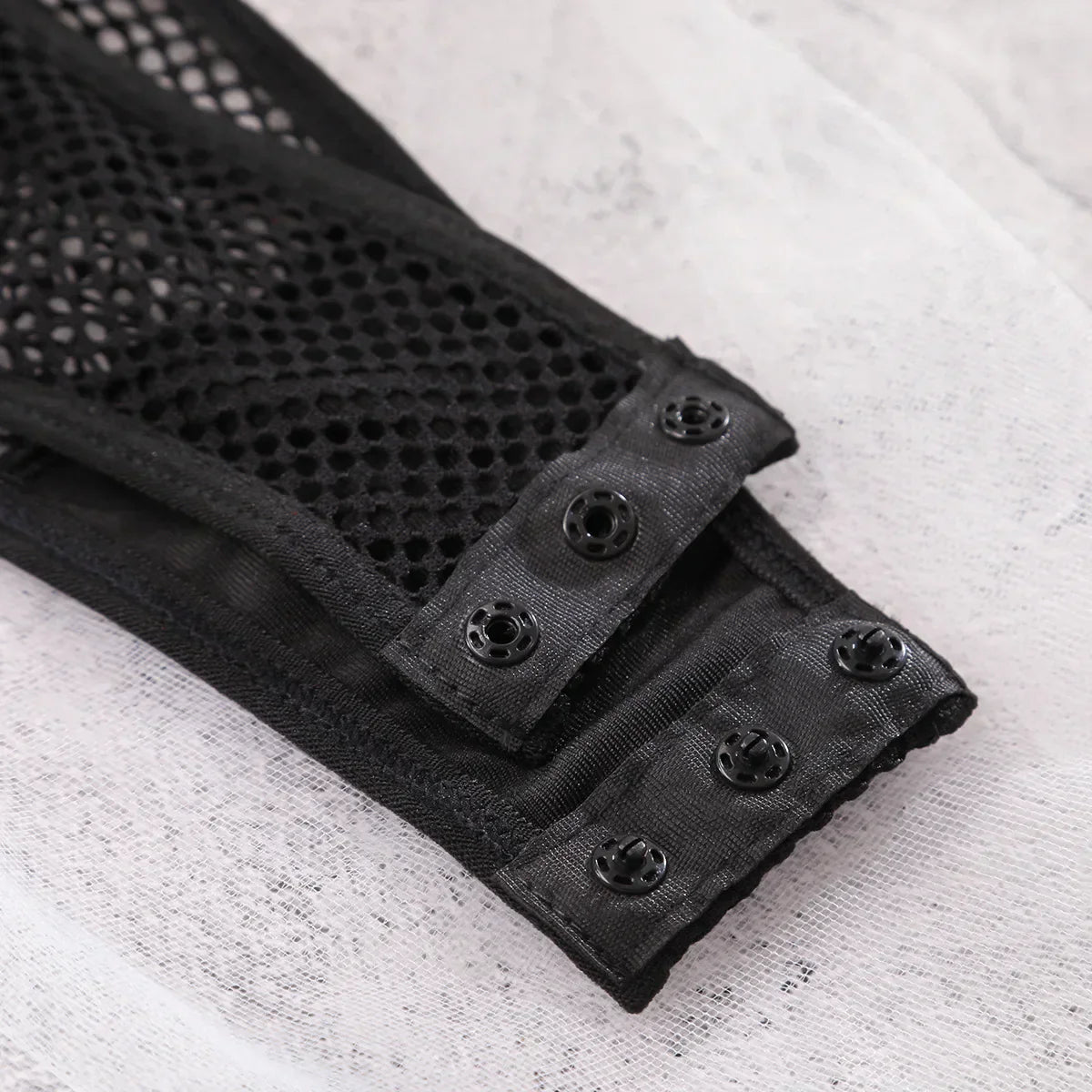 Mesh bodysuit with choker.