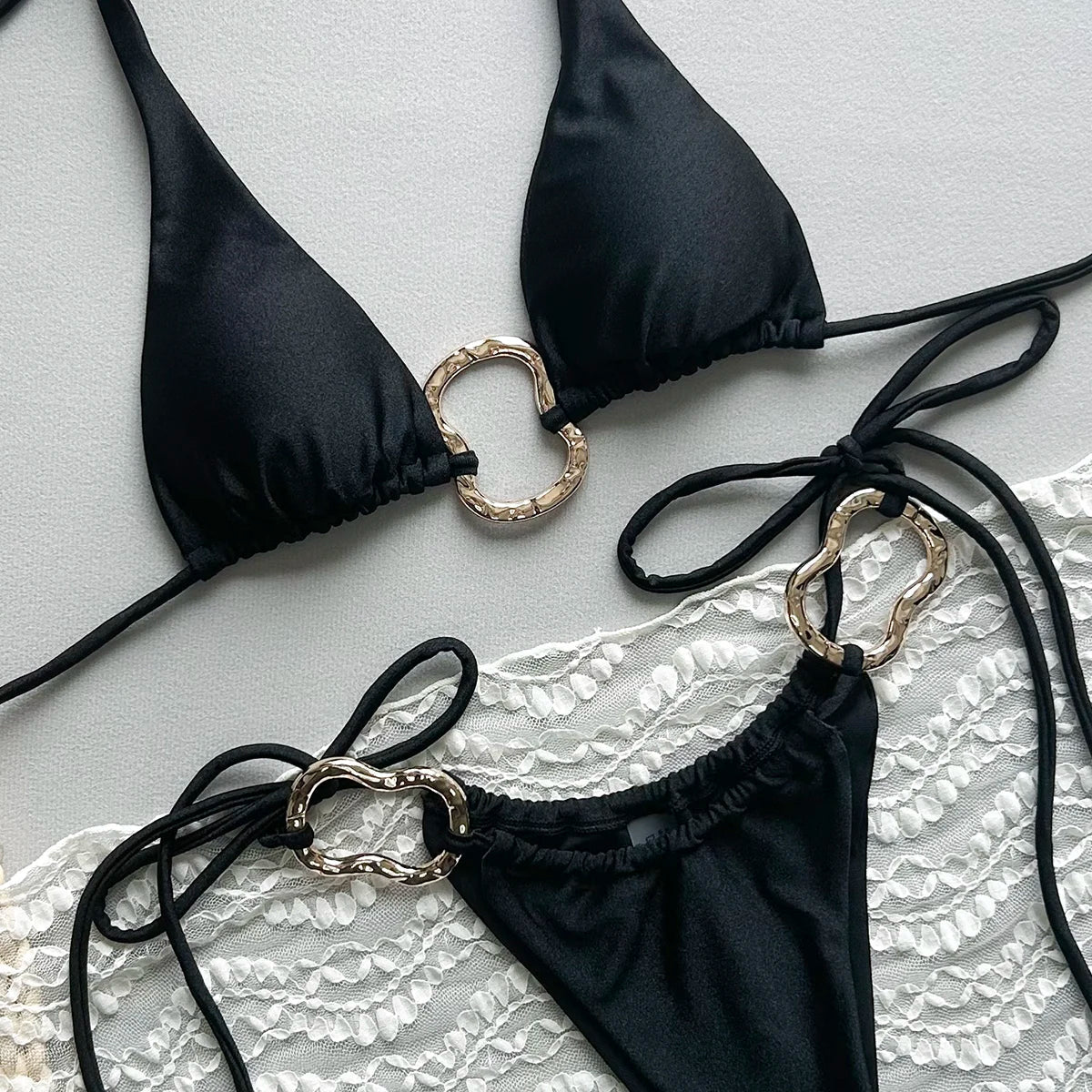 Two-piece swimsuit with triangular cups
