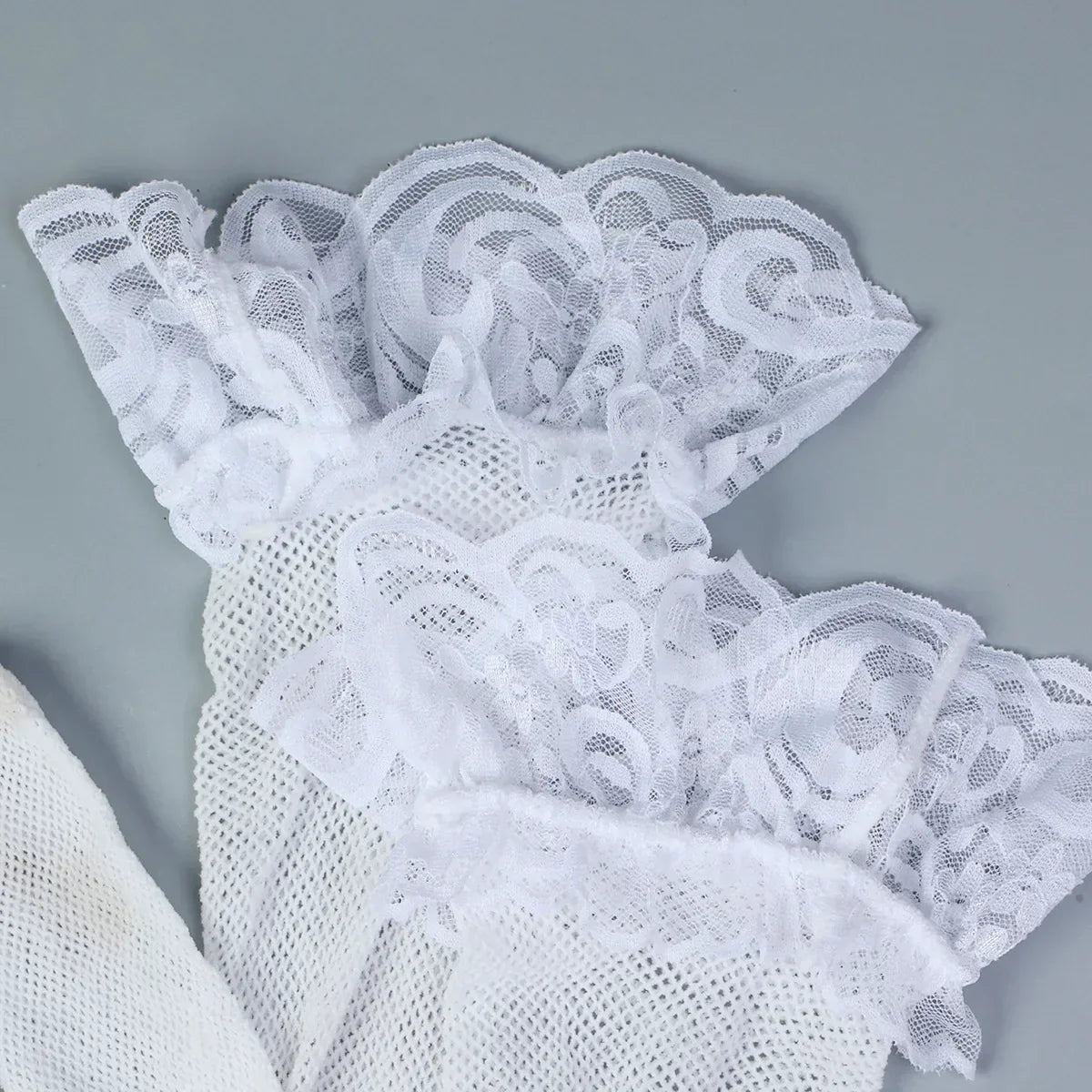 Lace bodysuit with a floral pattern