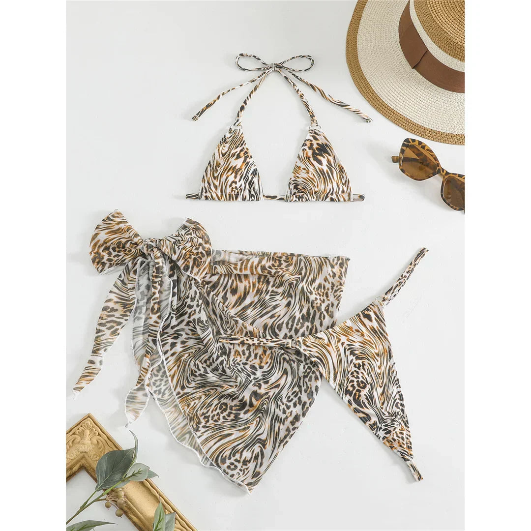 Two-piece leopard print swimsuit with a tie-up bikini top.