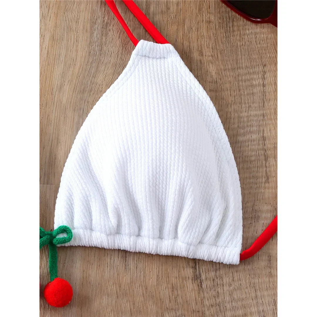 Two-piece swimsuit with ties at the hips and neck.