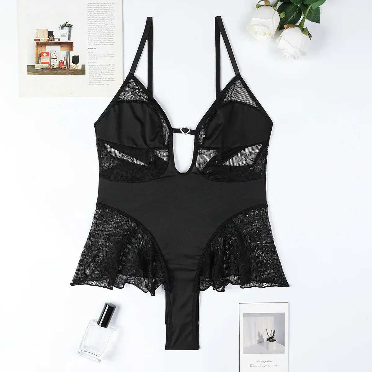 Body with a deep V-neckline adorned with rhinestones.