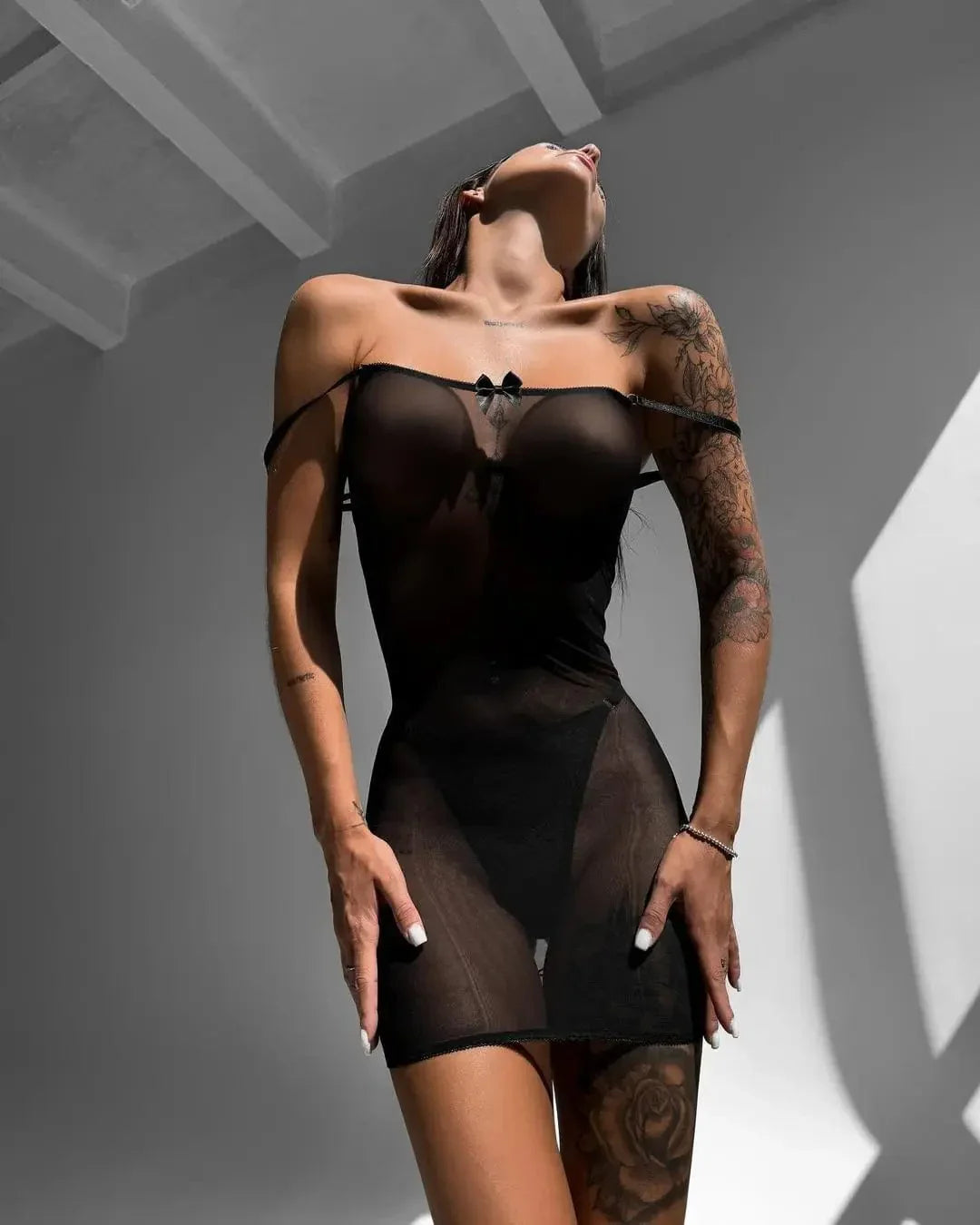 Dress with lacing at the back