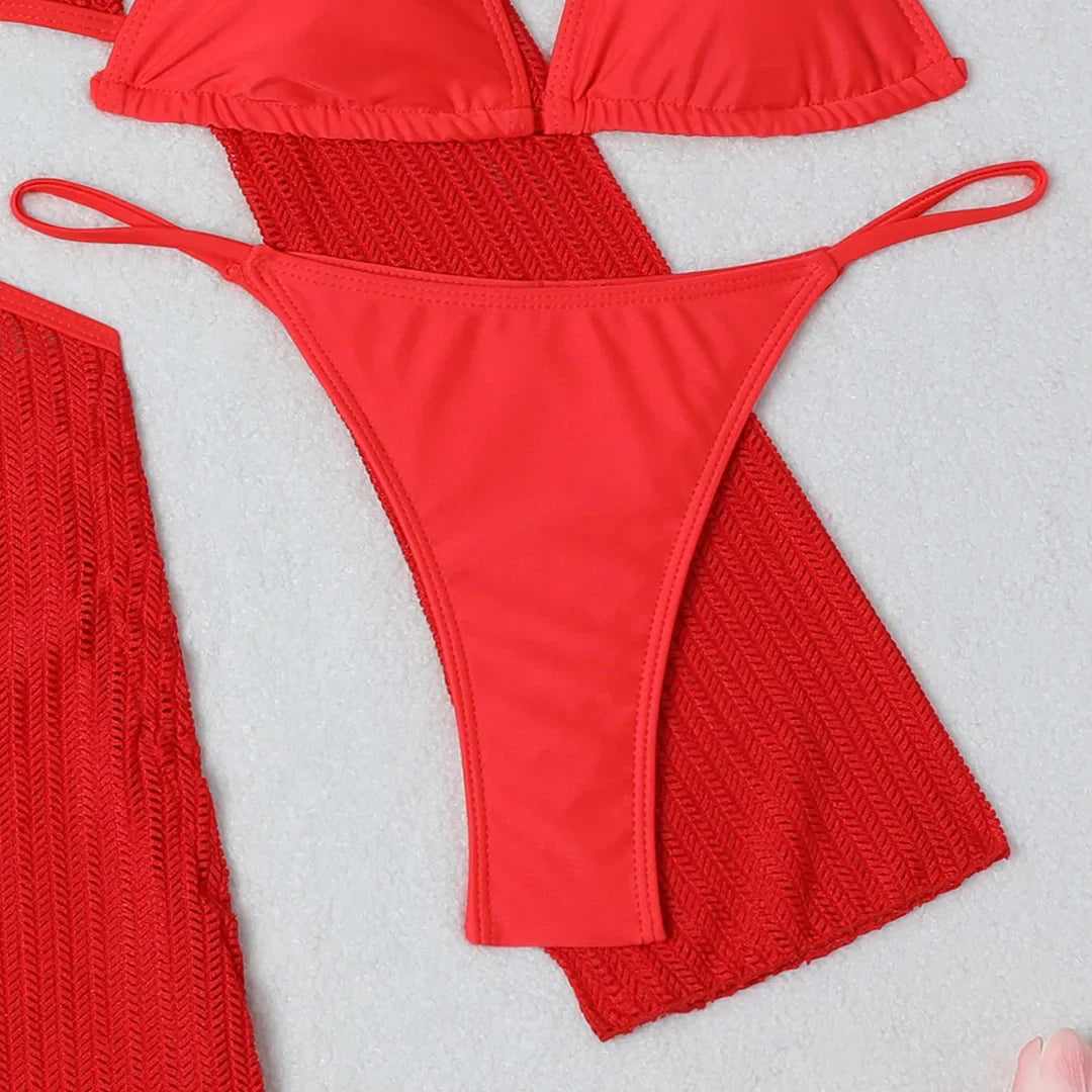 Bikini with an open back and a beach dress
