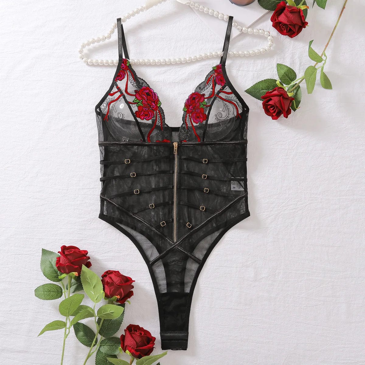Sheer bodysuit with embroidery on the bust