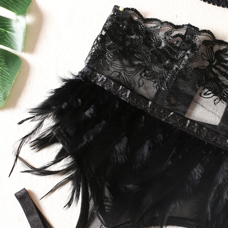 A lingerie set with a suspender belt adorned with feathers.