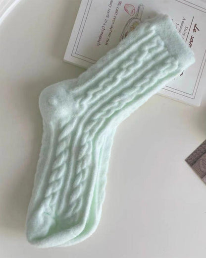 Long fluffy socks with a braided pattern