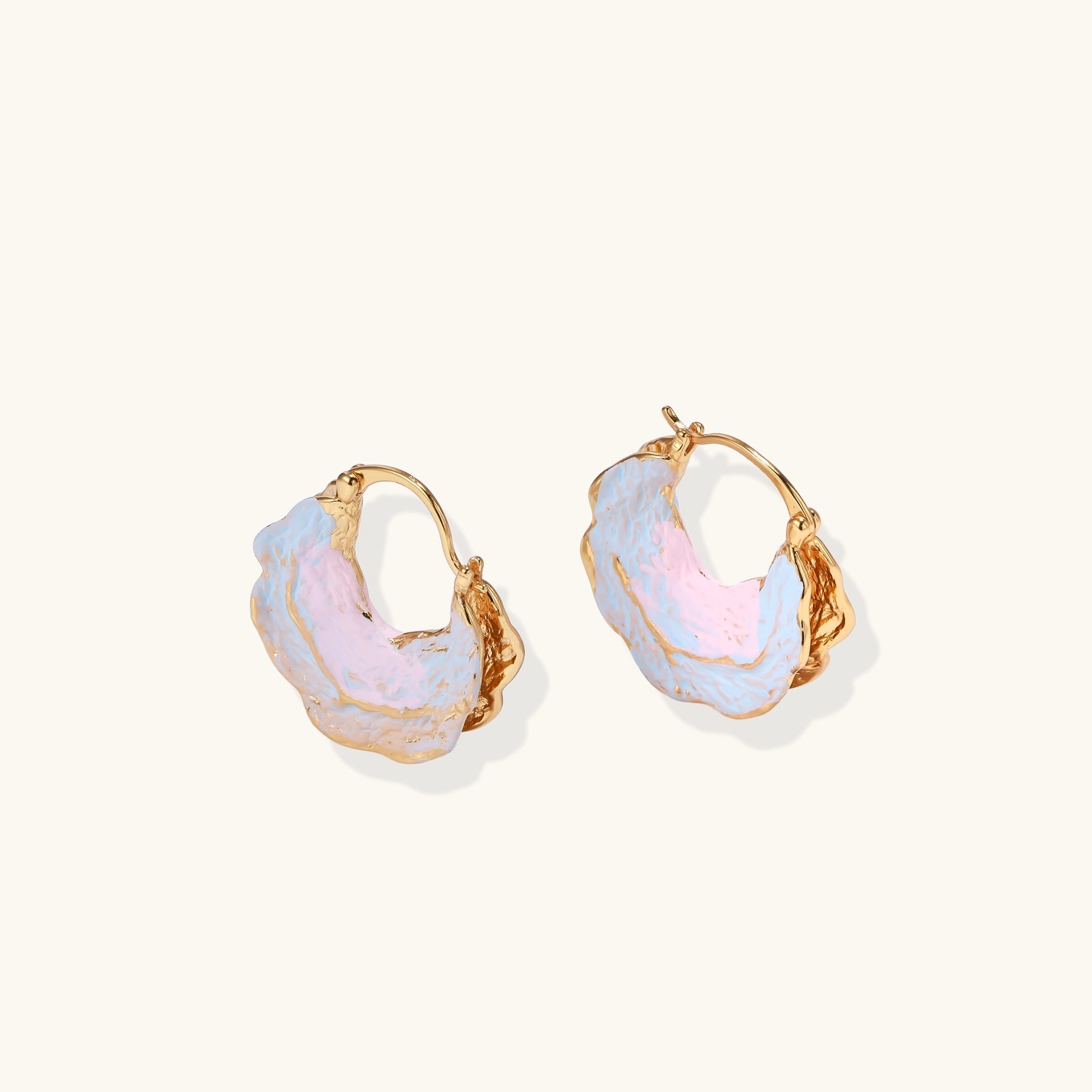 18K gold plated hoop earrings with iridescent enamel coating in blue and pink tones, organic shell-like design