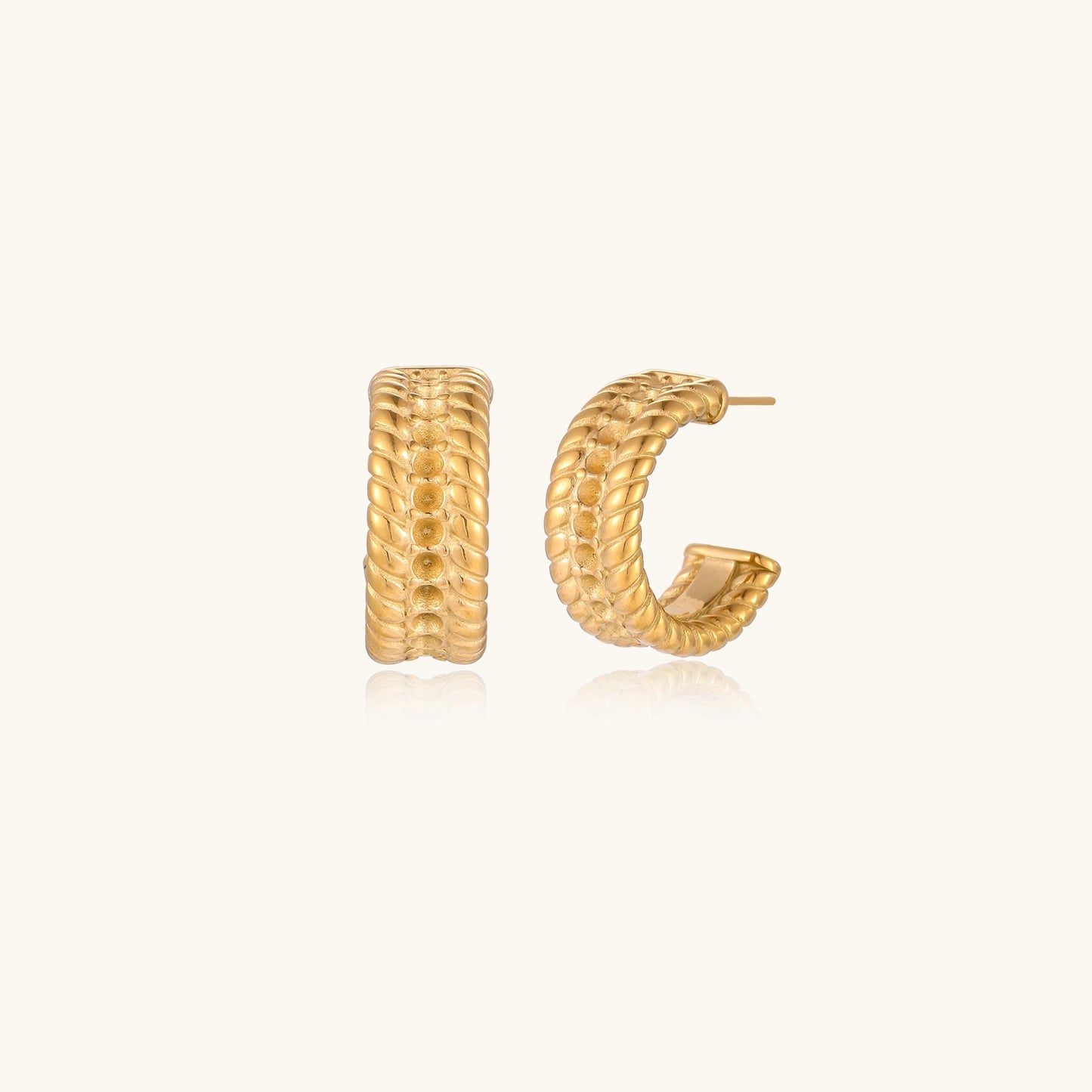 Close-up of 14K gold plated textured hoop earrings with rope pattern against cream background showing convertible design