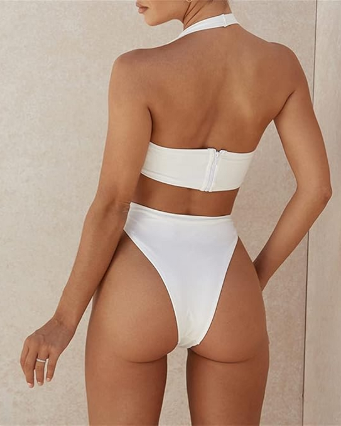 Asymmetrical swimsuit with deep cutouts