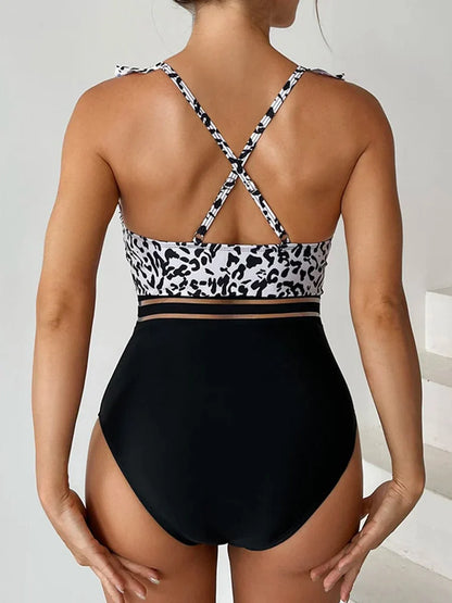One-piece swimsuit with a decorative frill