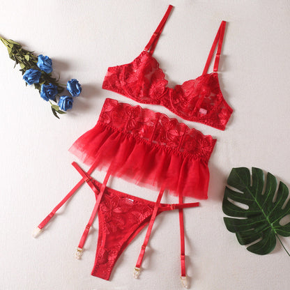 A set of lingerie made from sheer material with a floral pattern.
