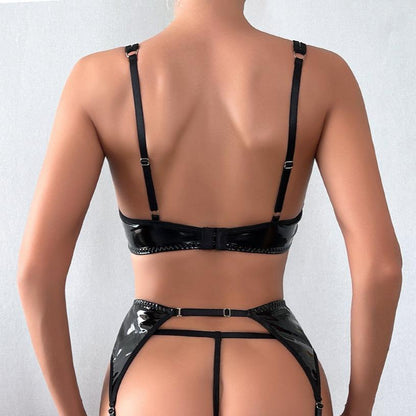Lingerie set imitating latex with cut-outs at the bust.