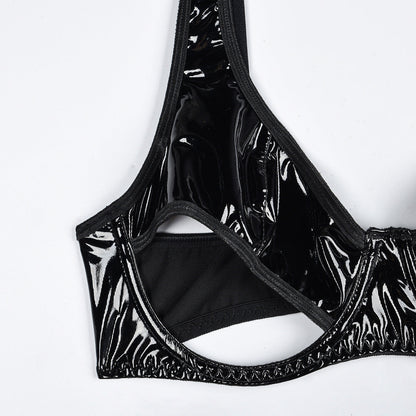 Lingerie set imitating latex with cut-outs at the bust.