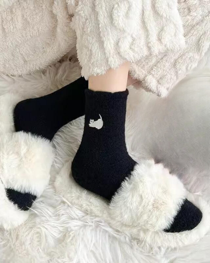 Warm fluffy socks with a kitten