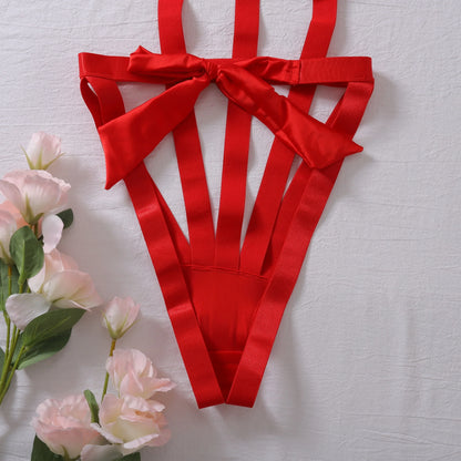 Body with a deep neckline and a bow on the bust.