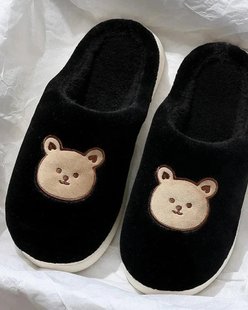 Warm fluffy slippers with a bear