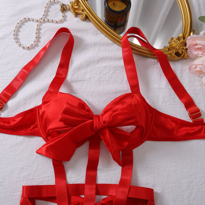 Body with a deep neckline and a bow on the bust.